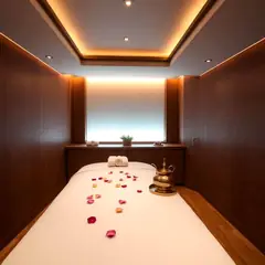 Clean treatment room for full-body therapeutic massage in Manikonda